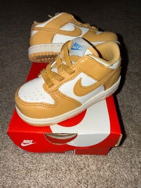 Nike Kids Dunk Low-Top Sneakers in Tan and White with Blue Logo
